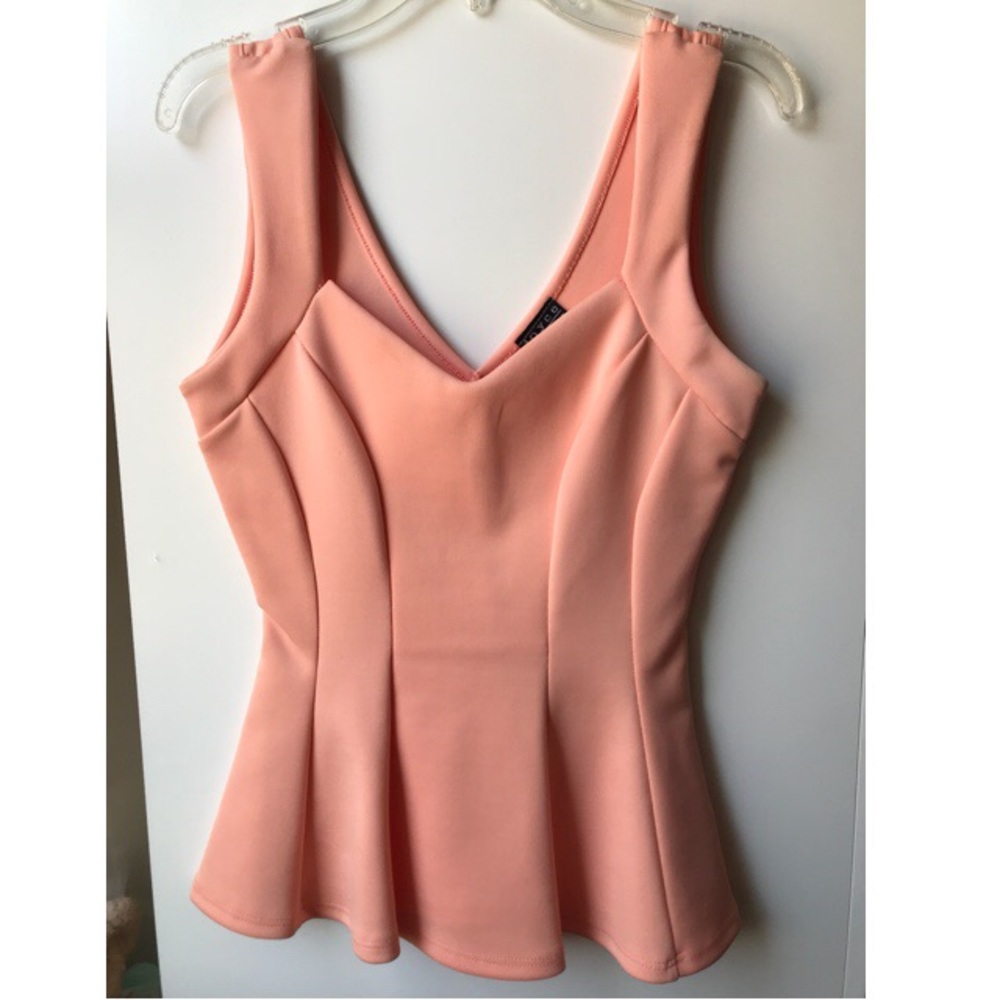 Joyce Leslie Coral Peplum Top!